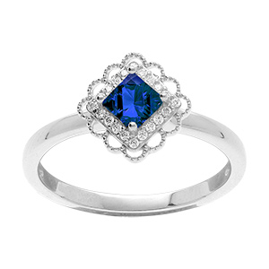Bague en argent rhodi� avec oxyde bleu carr� serti et halo d' oxydes blancs