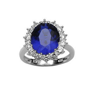 Bague en argent rhodi collection joaillerie orne d\'un oxyde bleu au centre entour de petits oxydes blancs - Vue 1