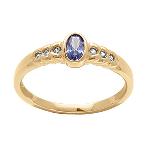 Bague en plaqu� or avec oxyde bleu oval et oxydes blancs sur les �paules de l'anneau serti clos