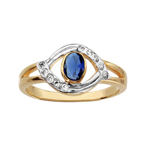 Bague en plaqu or jaune et blanc oeil avec oxyde bleu ovale au centre et pierres blanches synthtiques sur les contours