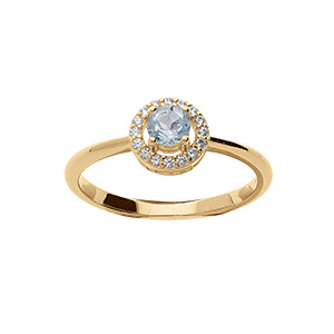 Bague en vermeil avec topaze bleue vritable et contour d'oxydes blancs sertis
