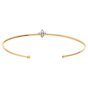 Bracelet en plaqu� or jonc ouvert ave fleur d'oxydes blancs
