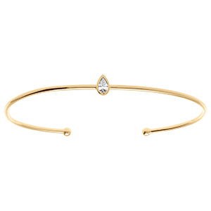 Bracelet en plaqu� or jonc ouvert avec goutte d'oxyde blanc serti clos