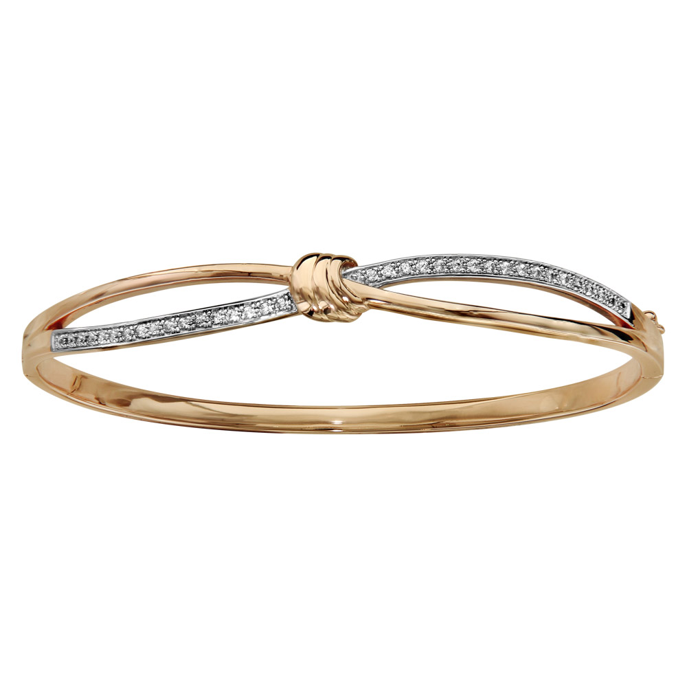 Bracelet jonc en plaqu� or articul� noeud et oxydes blancs sertis - Vue 1