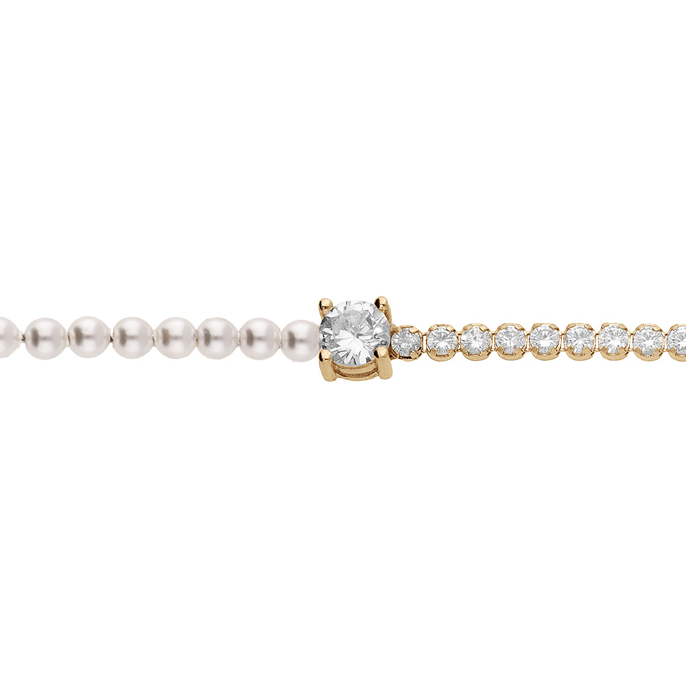 Bracelet en argent et dorure jaune 1 coté rivière oxydes blancs et 1 coté perles blanches de synthèse avec oxyde rond blanc serti 16+3cm