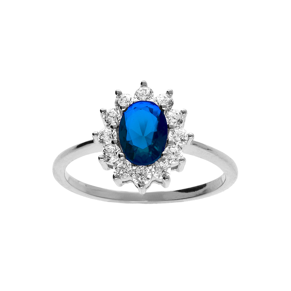 Bague en argent rhodié collection joaillerie oxyde bleu au centre et petits oxydes blancs autour