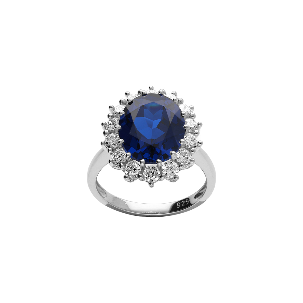 Bague en argent rhodié collection joaillerie ornée d'un oxyde bleu au centre entouré de petits oxydes blancs