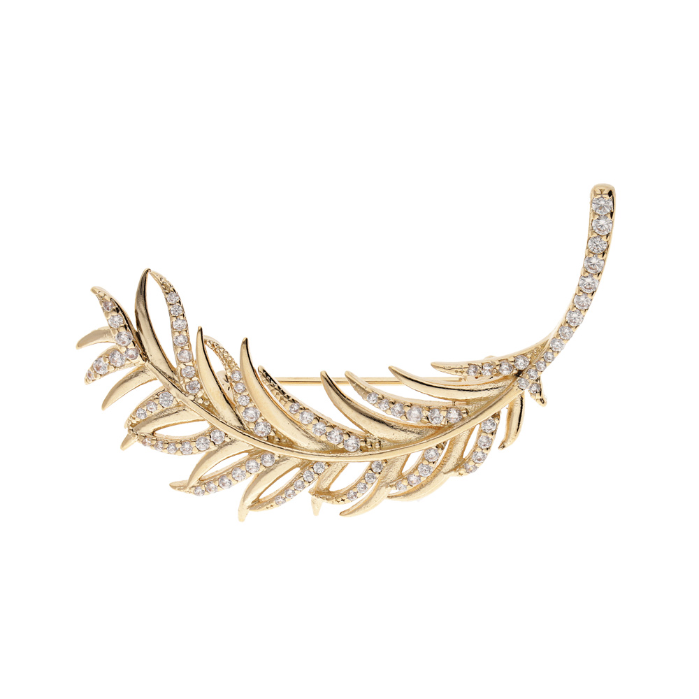Broche en plaqué or motif feuillage avec oxydes blancs sertis Broche en plaqué or motif feuillage avec oxydes blancs sertis