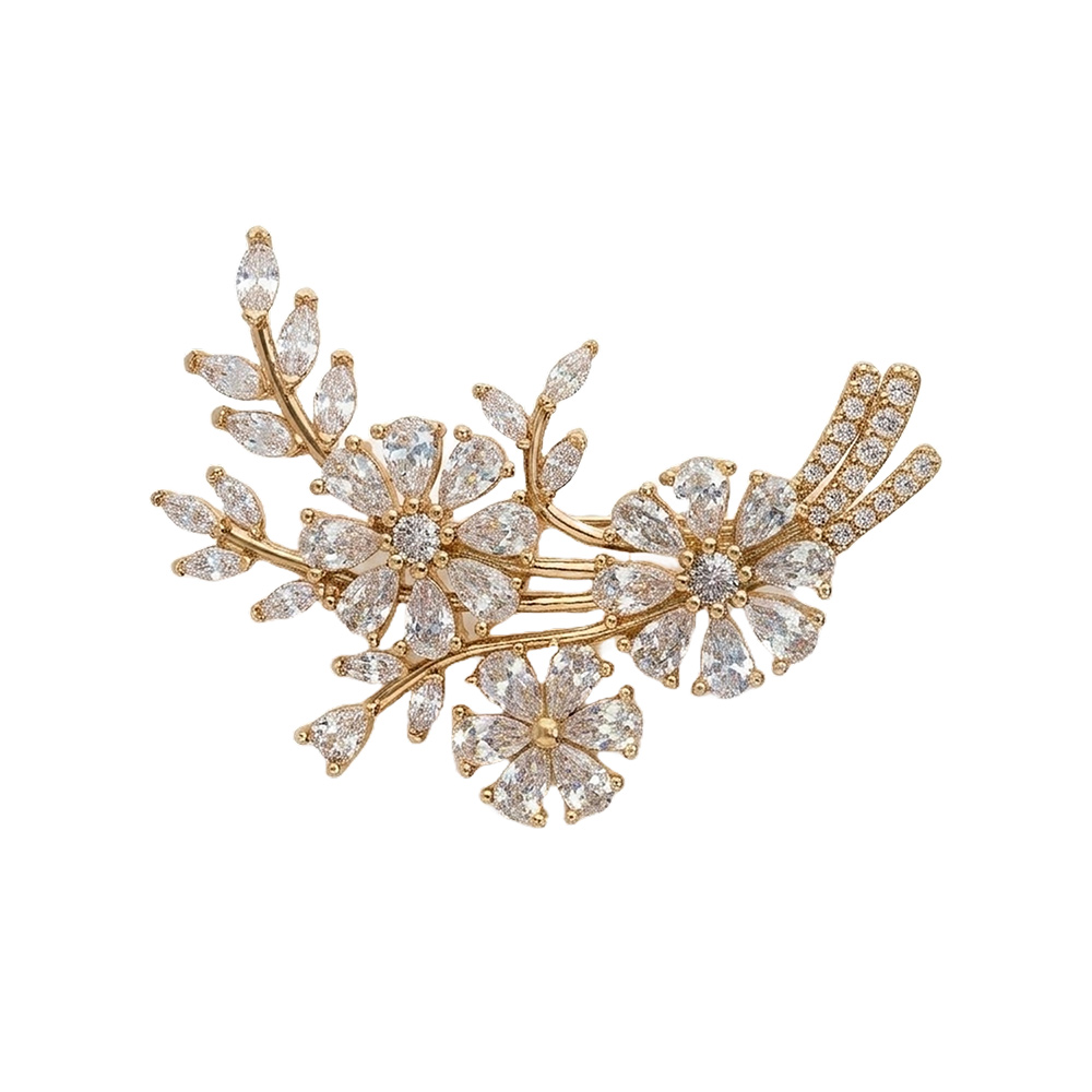 Broche en plaqué or motif feuillage et fleurs avec oxydes blancs sertis Broche en plaqué or motif feuillage et fleurs avec oxydes blancs sertis