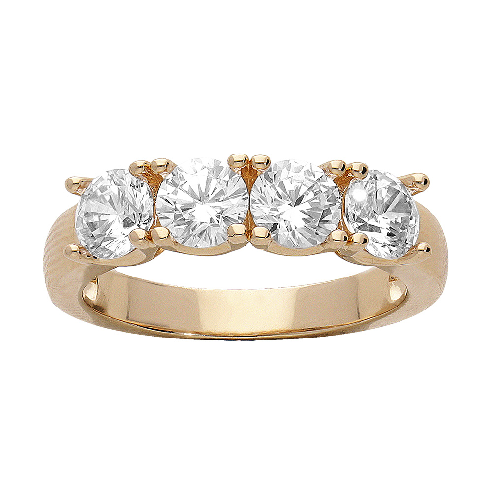 Bague en plaqué or type alliance avec 4 oxydes blancs sertis Bague en plaqué or type alliance avec 4 oxydes blancs sertis