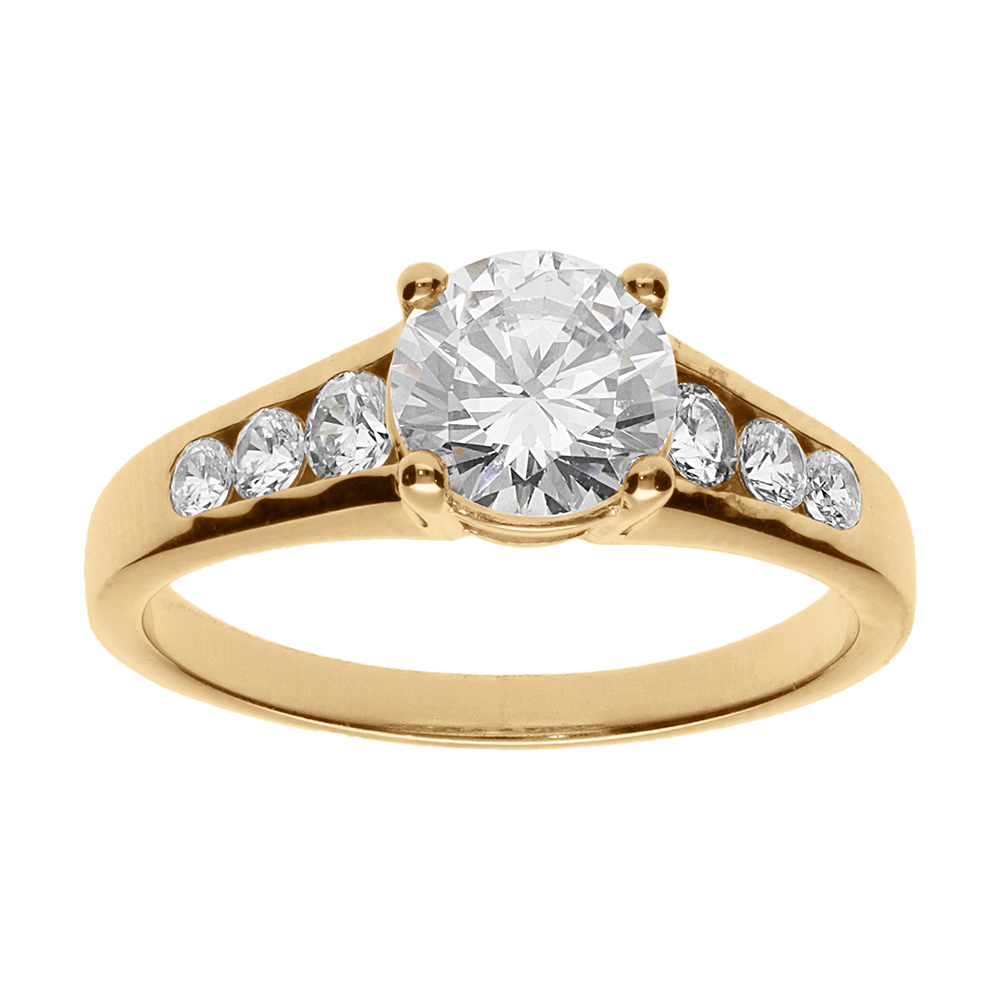 Bague en plaqué or gros oxyde blanc serti 4 griffes au centre et 3 oxydes blancs plus petits de chaque côté