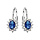 Boucles d'oreilles en argent rhodi collection joaillerie oxyde bleu au centre et petits oxydes blancs autour - fermoir dormeuse