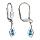 Boucles d'oreilles en argent rhodi losange suspendu avec oxyde bleu clair et fermoir dormeuse