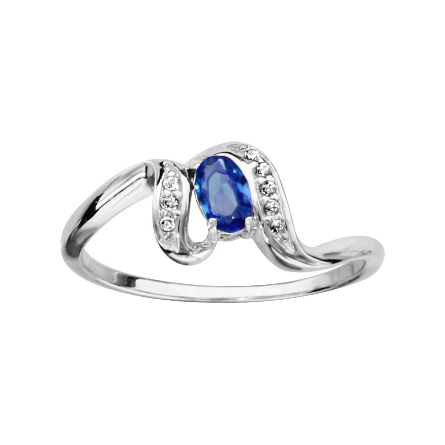 Bague en argent rhodié collection joaillerie oxyde ovale bleu au centre et vagues ornées d’oxydes blancs sertis sur les côtés