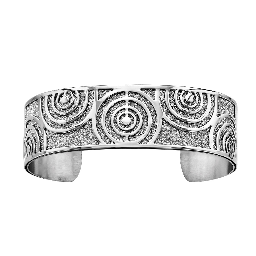 Bracelet en acier manchette motifs cercles brillants sur fond glitter