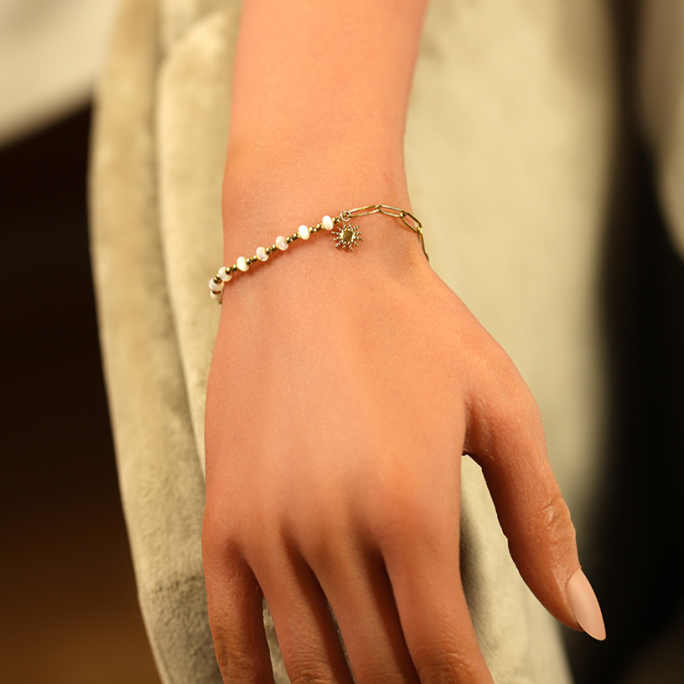 Bracelet en acier avec perles rondelles blancheset  pampille soleil  -16+3cm - Vue 20