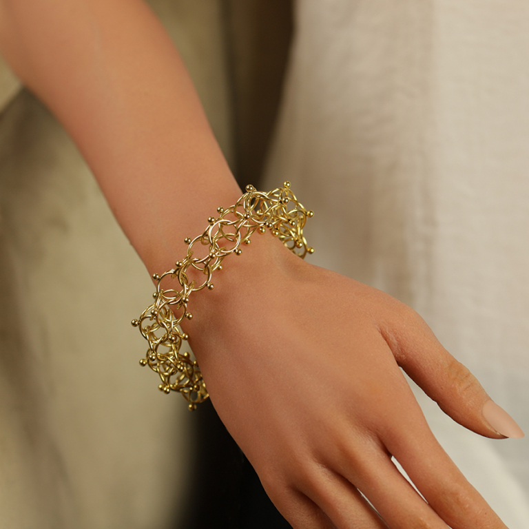 Bracelet en acier dor maille \