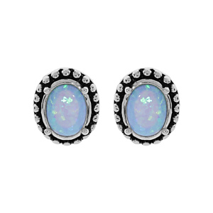 Boucles d’oreille en argent rhodié Opale bleue de synthèse cerclée de picot patiné et fermoir poussette