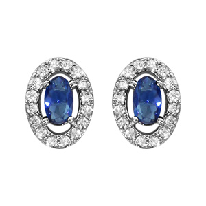 Boucles d’oreilles en argent rhodié collection joaillerie oxyde ovale bleu avec entourage d’oxydes blancs sertis et fermoir poussette
