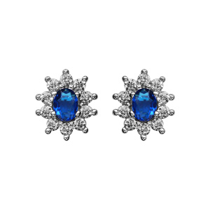 Boucles d'oreilles en argent rhodié collection joaillerie pierre centrale bleu foncé contour oxydes 