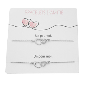 Bracelets d’amitié en argent rhodié vendus par 2 chaîne avec double coeurs et oxydes blancs sertis 15+3cm sur son support cartonné