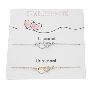 Bracelets d’amitié en argent vendus par 2 chaîne dont 1 en dorure jaune avec double coeurs et oxydes blancs sertis 15+3cm sur son support cartonné