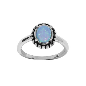 Bague en argent rhodié Opale bleue de synthèse cerclée de picot patiné