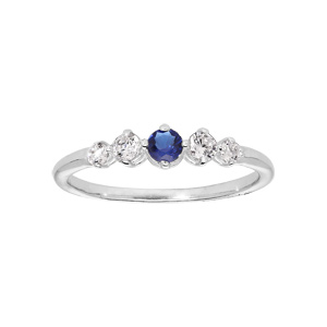 Bague en argent rhodié avec 4 oxydes blancs sertis et 1 au centre bleu nuit