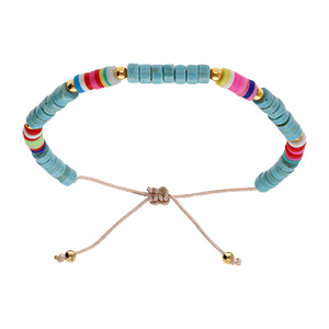 Bracelet en acier cordon coulissant rondelles turquoise imitation et caoutchouc colorés