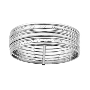 Bracelet jonc en acier semainier avec 4 rangs lisses et 3 diamantés dans un style différent diamètre 65