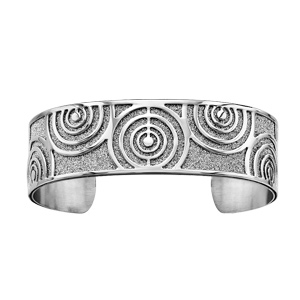 Bracelet en acier manchette motifs cercles brillants sur fond glitter