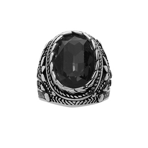 Chevalière en acier patiné avec gros oxyde ovale noir