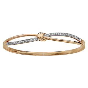 Bracelet jonc en plaqué or articulé noeud et oxydes blancs sertis