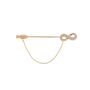 Broche en plaqué or fibule tête motif infini et oxydes blancs sertis
