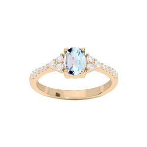 Bague en plaqué or avec gros Topaze bleu et oxydes blancs sertis