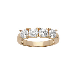 Bague en plaqué or type alliance avec 4 oxydes blancs sertis